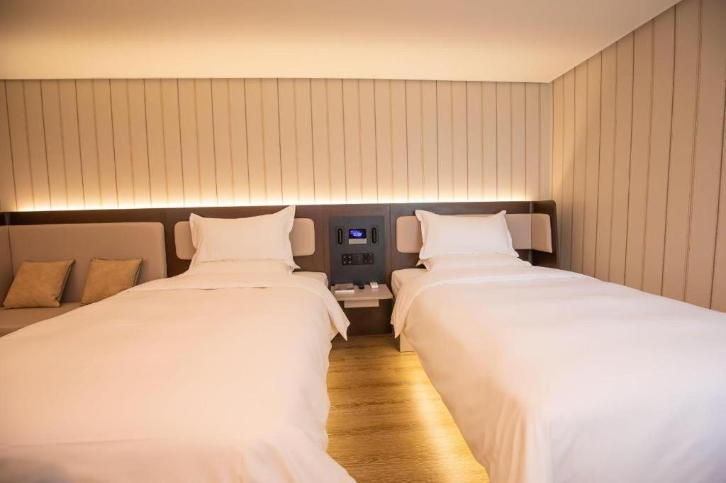 Hanting Hotel Guangzhou Tianhe Экстерьер фото