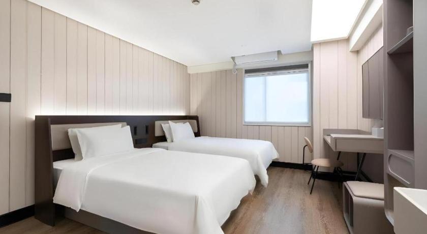 Hanting Hotel Guangzhou Tianhe Экстерьер фото
